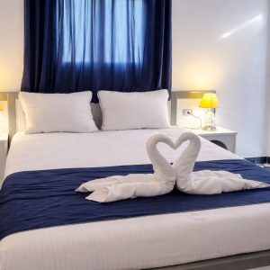 Standard BLUE room - 1 Queen bed - small balcony - Rear view